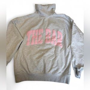 The Bar gray high neck sweatshirt with pink logo